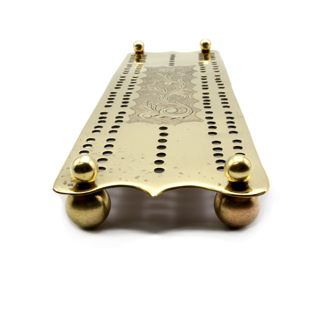 Engraved brass cribbage board