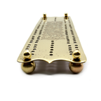 Engraved brass cribbage board