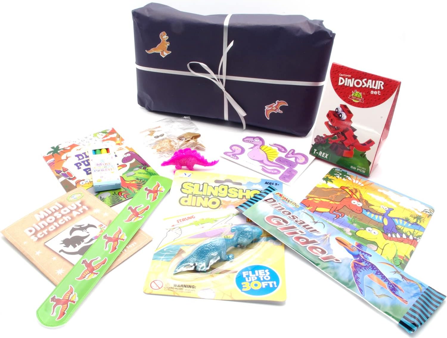 Dinosaur themed Pass the parcel party game with a mix of dinosaur toys