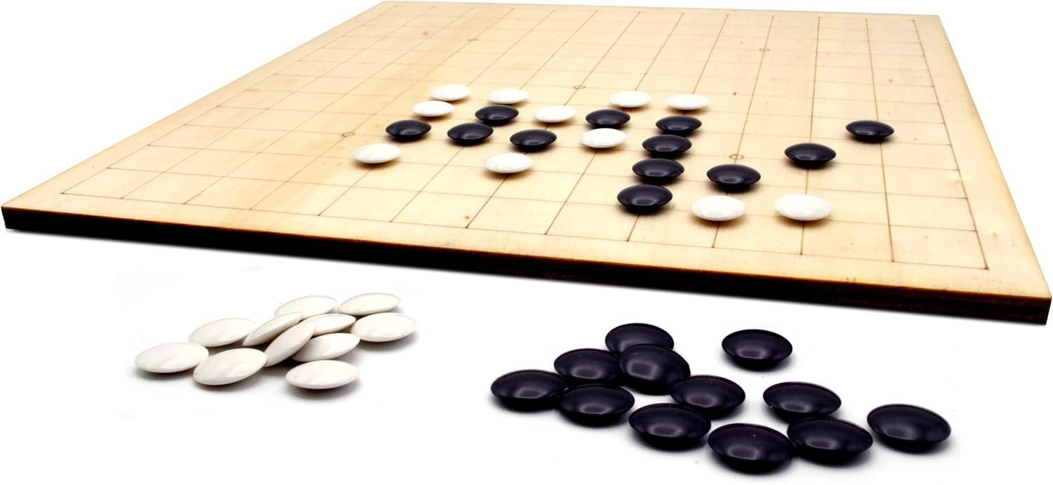 Go Game board with black and white stones 