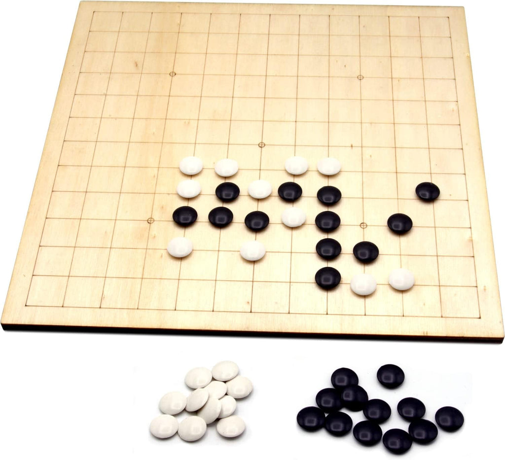 Go game board with black and white stones 