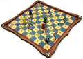 Wooden snakes and ladders board game with game pieces and die.