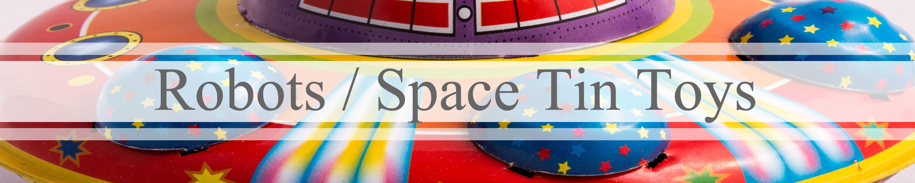 Robots / space tin toys banner with ufo space tin toy in background