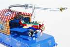 Close up of Aeroplane hangar tin toy