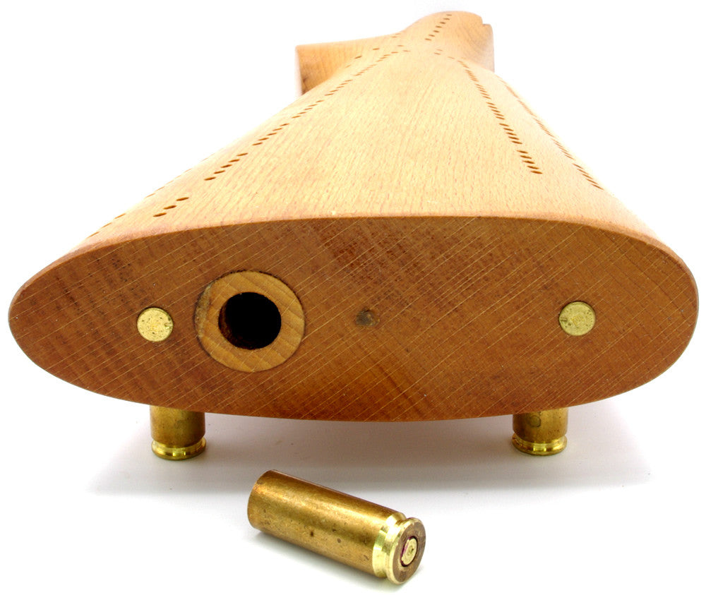 Rifle-butt cribbage board.