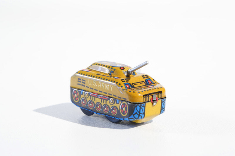 Yellow tank tin toy  with 'U.S. Army' text 