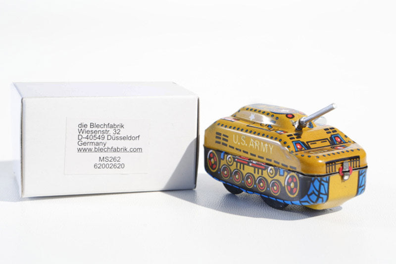 Yellow tank tin toy  with 'U.S. Army' text  with packaging