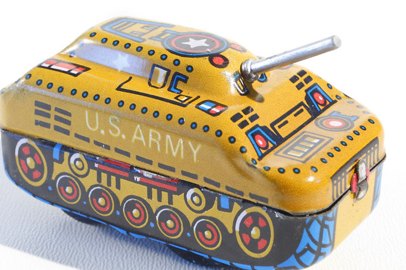 Yellow tank tin toy  with 'U.S. Army' text 