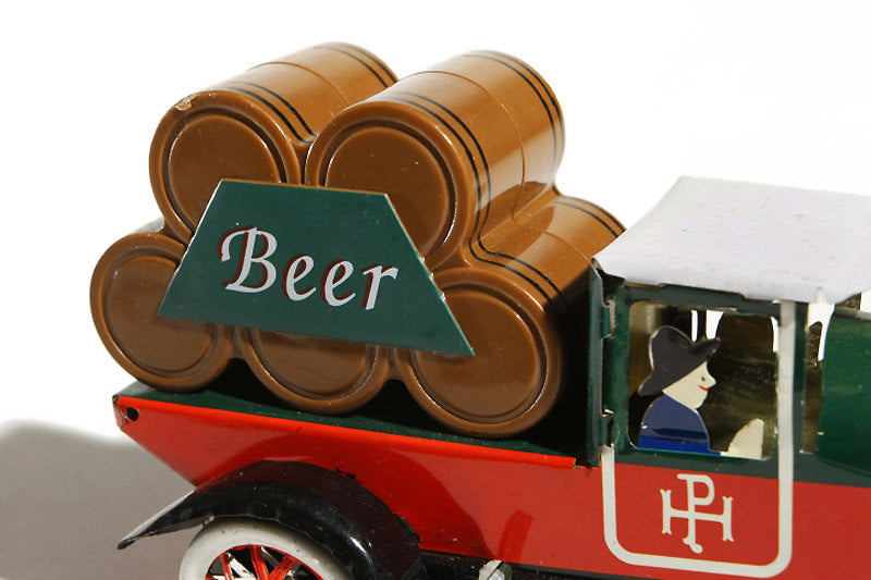 Close up of beer delivery truck tin toy