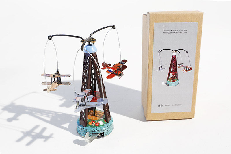 Biplane Carousel tin toy with 3 planes and packaging