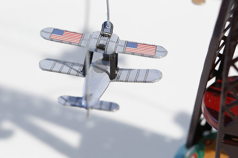 Biplane Carousel tin toy with American plane