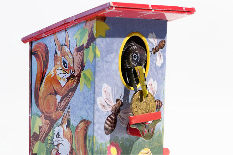 Decorative bird bank tin toy