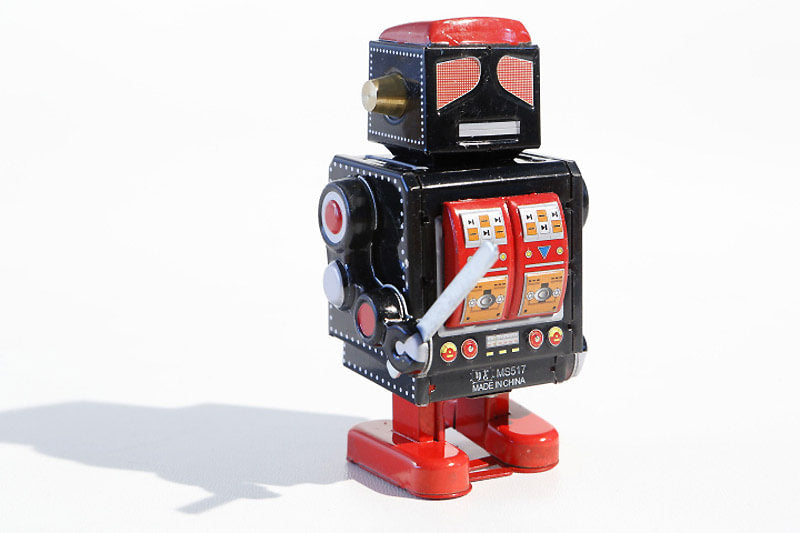 Black Robot with sword Vintage-style tin toy robot 