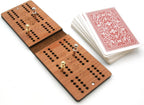 Brown leather cribbage board with playing cards and cribbage pegs 