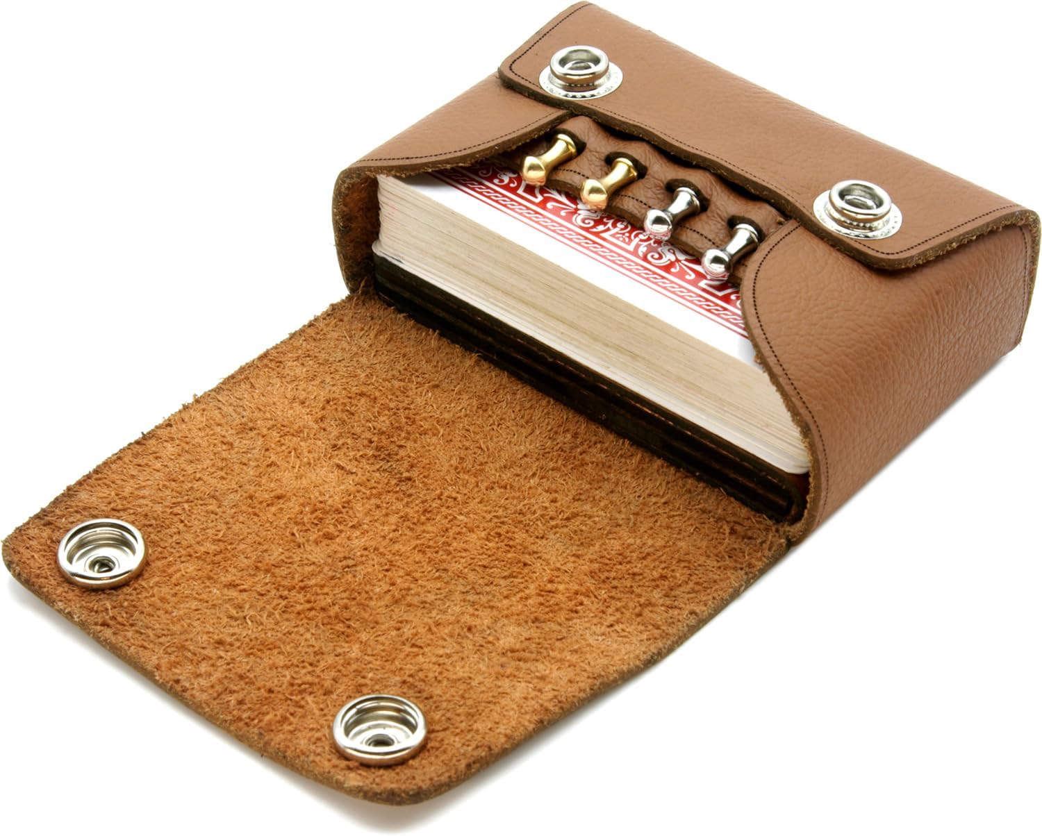 Brown leather cribbage set with cribbage board, pegs and playing cards all within the brown leather pouch.
