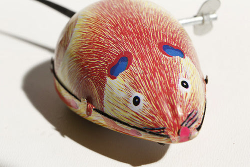 Brown mouse tin toy with wind up key