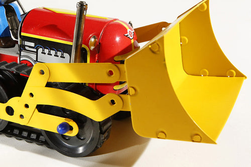 Close up of Bulldozer Tin toy
