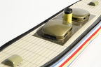 Close up of Canal barge tin toy candle boat 
