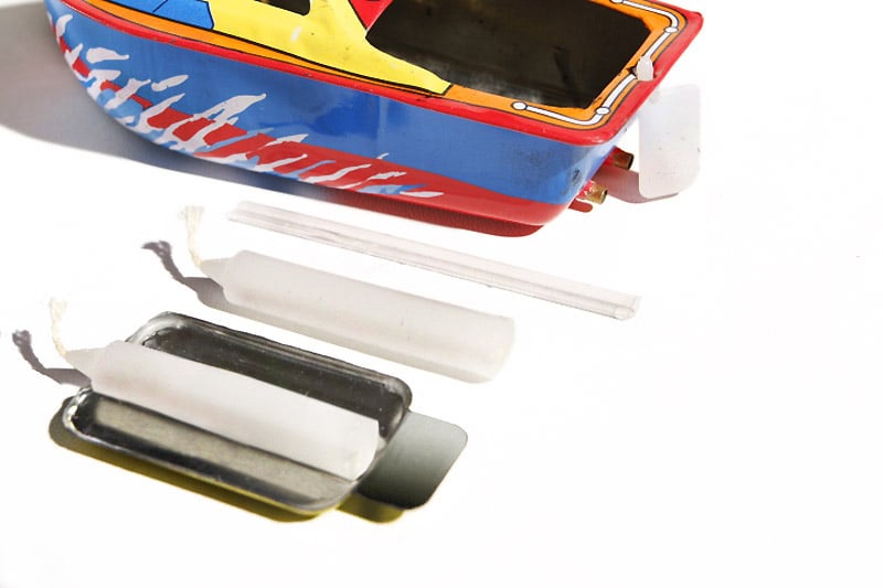 Close up of Pop Pop candle boat Tin Toy