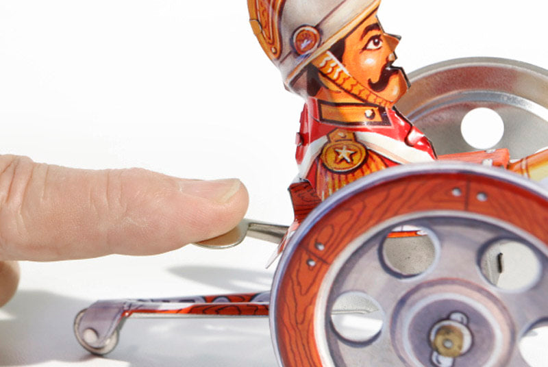 Close up of Tin Cannon tin toy