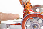Close up of Tin Cannon tin toy