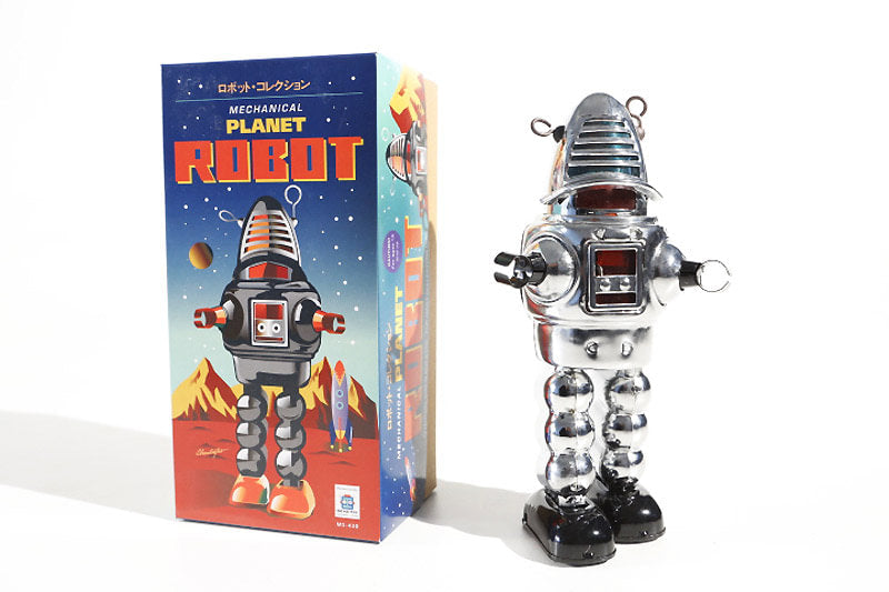 Chrome sparking Vintage tin toy robot with its packaging