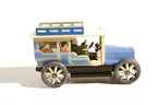 classic car tin toy  with driver and passengers