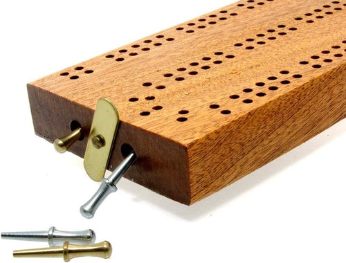 Continuous 2 track hardwood cribbage board with peg storage