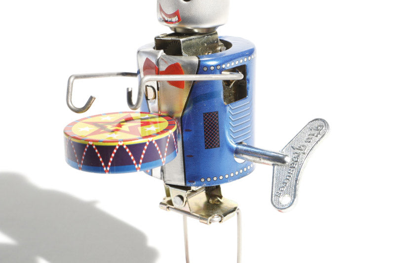 Dancing Vintage-style robot tin toy with a colourful design 
