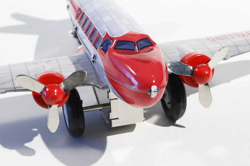 Close up of Schylling DC3 Plane tin toy