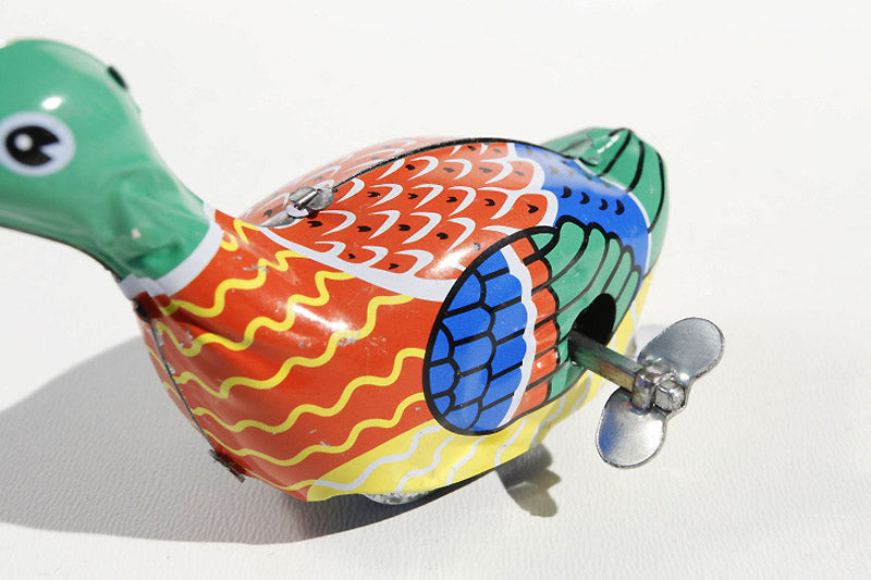 Swimming duck tin toy with wind up key