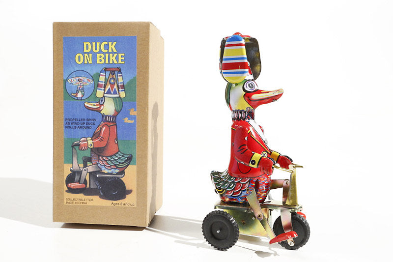 Duck on Trike tin toy with packaging