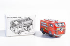 Red fire engine tin toy with packaging
