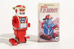 Fireman tin toy robot with a box labelled 'Mechanical Space F.D. Robot' 