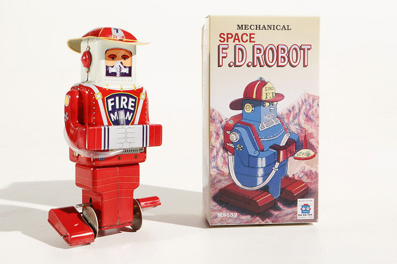 Fireman tin toy robot with a box labelled 'Mechanical Space F.D. Robot' 