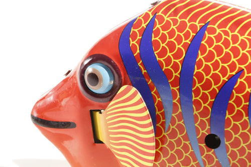 Happy fish Tin Toy face