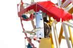 Close up of German ferris wheel tin toy key