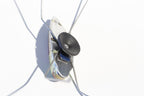 Bottom of the grasshopper tin toy