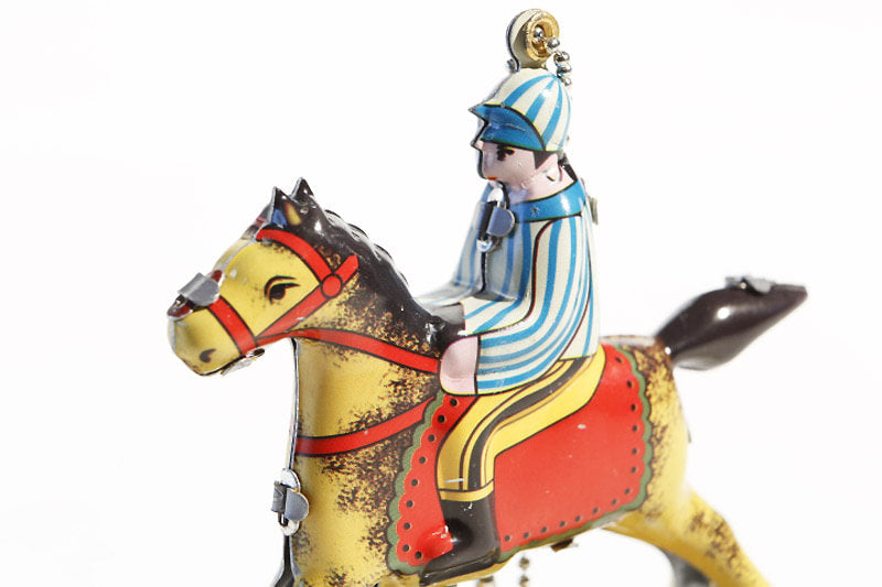 Hanging horse tin toy, horse with rider on 