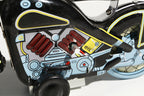 Close up of black Harley Davidson tin toy