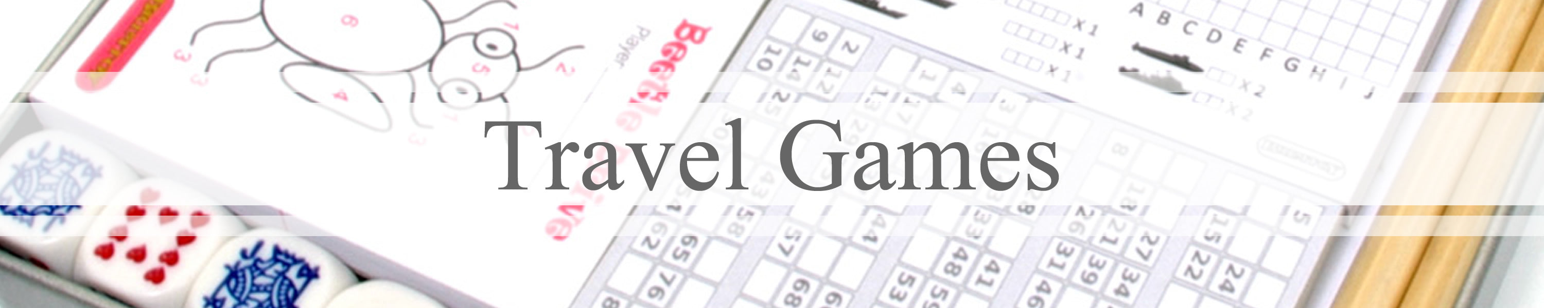 Travel games banner with score pads, pencils and dice