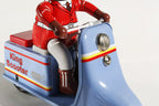 Close up of King Scooter Tin Toy - blue bike with rider wearing red