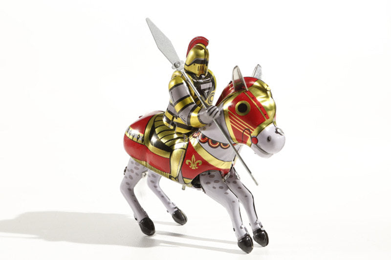 Knight on horseback tin toy