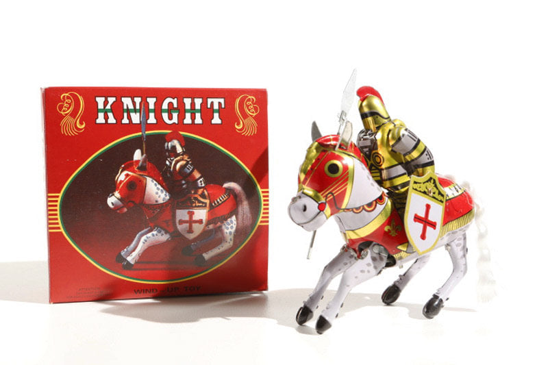 Knight on horseback tin toy with colourful packaging