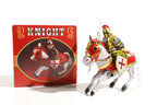 Knight on horseback tin toy with colourful packaging