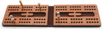 Leather and mahogany cribbage board with cribbage pegs