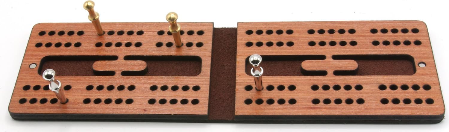Leather and mahogany cribbage board with cribbage pegs