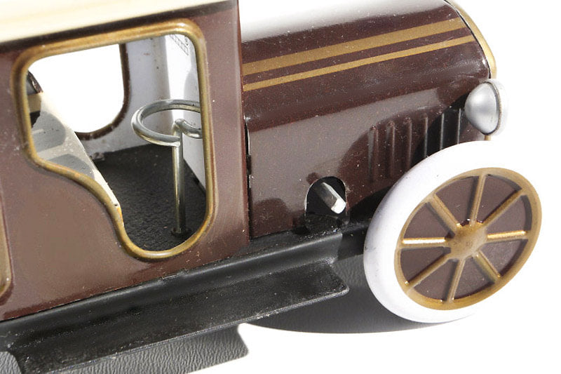 Close up of limousine tin toy car