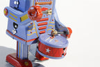 Little Drumming Vintage-style robot tin toy with blue and red colours 