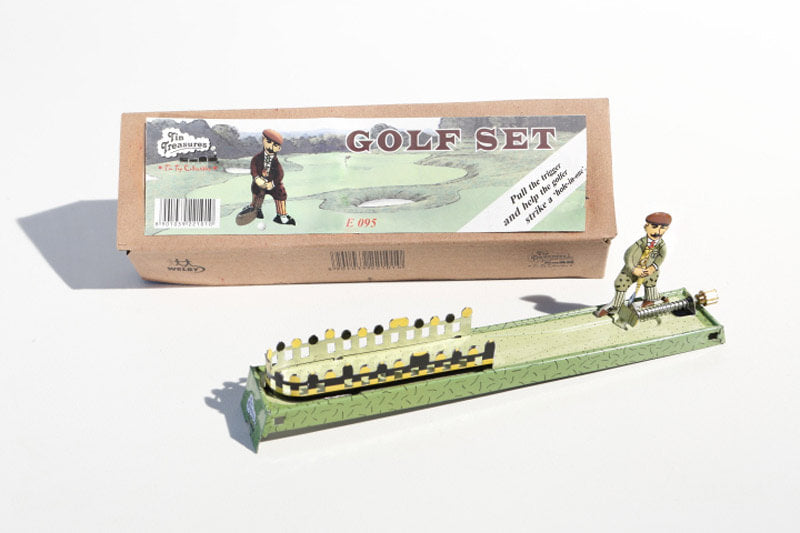 Little golfer tin toy with packaging